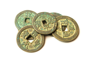 Ancient bronze coins of China on white