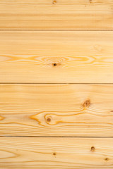 Fototapeta premium New wooden boards background texture close-up shot, vertical