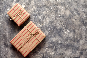 Gifts for grey abstract grunge background with white spots suitable for use in classic design. Marble background. Loft style design ideas.