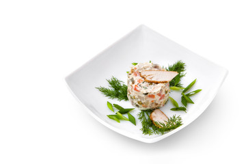 Russian traditional salad Olivier with greens