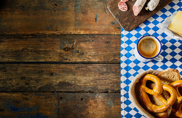 Bavarian breakfast with pretzel, sausage, coffee