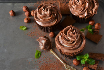 Chocolate cupcakes with peanut paste the old grunge background