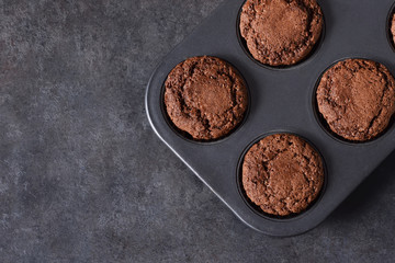 Chocolate muffins, brownies with nuts and chocolate. 