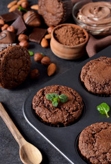 Chocolate muffins, brownies with nuts and chocolate.