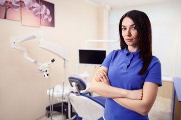 Female intern in dentist clinic