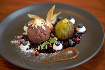 close up of chocolate ice cream dessert on plate
