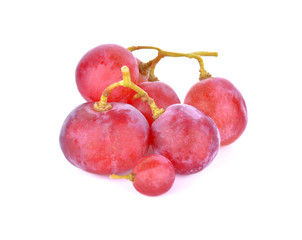 Red grapes on a white background