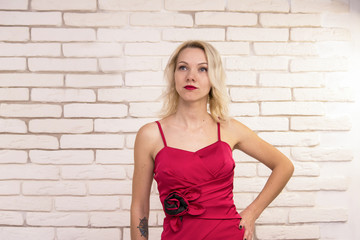 pretty blonde girl in a red dress