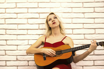 Fototapeta na wymiar girl playing the guitar