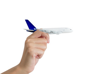 Woman hand holding model aeroplane, isolated on white background.