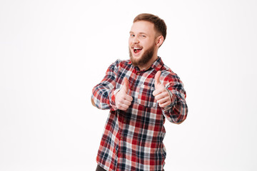 Happy Bearded man in shirt showing thumbs up