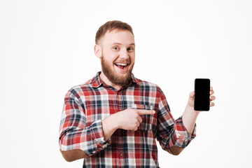 Bearded man in shirt showing blank smartphone screen