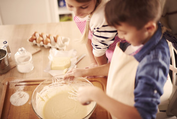 Obraz na płótnie Canvas Homemade pastry made by children