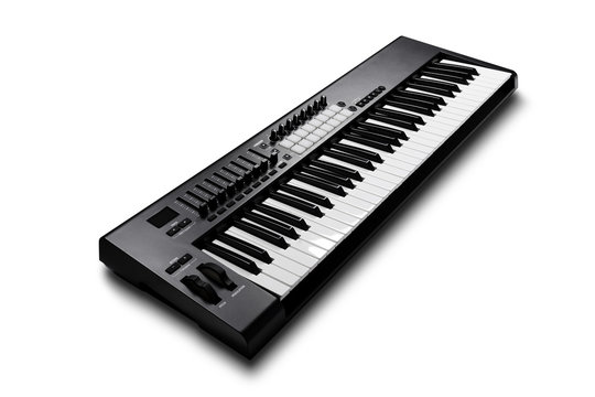 Electronic synthesizer piano isolated on white with clipping pat