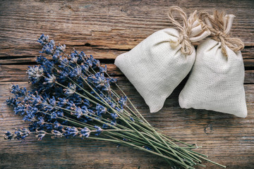 Bouquet of dry lavender flowers and sachets filled with dried lavender