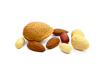 Almonds and peanuts isolated on white background