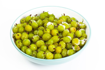 Frozen gooseberries on white
