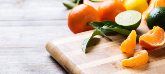 Citrus fruits background. Orange, grapefruit, tangerine, lime, lemon vitamin