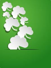  Paper texture shamrock on green background