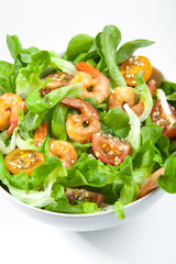 Shrimp salad with cherry tomatoes in bowl, closeup. Healthy food concept
