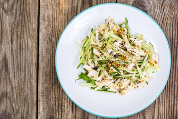 Salad with cucumber, chicken and mustard