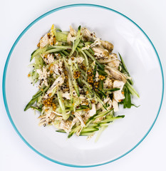 Chicken salad, fresh vegetables and chia seeds