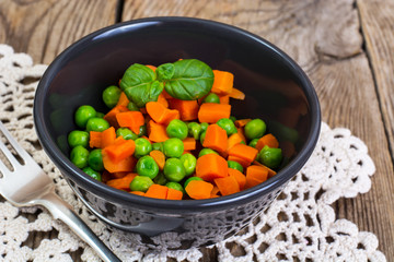 Mix boiled vegetables in a salad bowl