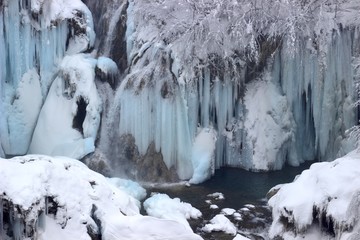 Plitvice lakes, National park in Croatia, winter landscape with frozen waterfalls 