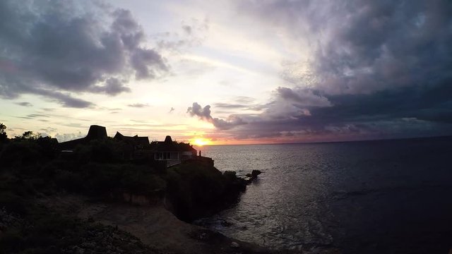 Ocean sunset on a tropical island Nusa Lembongan, Bali, Indonesia. Slow motion.