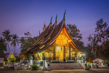 Wat Xieng thong temple at twilight time in Luang Pra bang, Laos.
