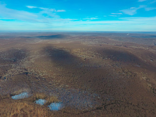 Aerial view of the autumn under the blue sky.