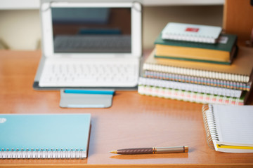 Office desk table with computer, supplies. Copy space for text