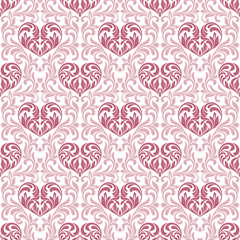Seamless pattern. Pink hearts made in swirls, leaves and floral elements on a floral background 