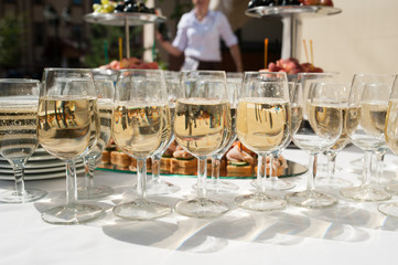 wedding reception. Table with snacks and glasses of champagne in a restaurant