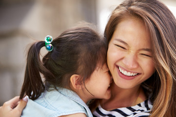 Outdoor Portrait Of Loving Mother And Daughter
