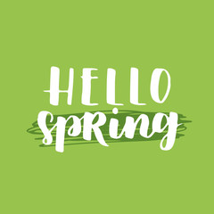 Vector seasonal greeting card of hand-written spring brush lettering. Spring collection white ink and green floral elements on green background. Trendy greenery color of spring 2017.