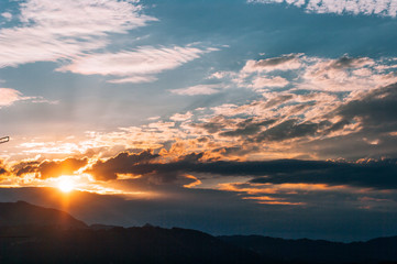 Naklejka premium Sun rising behind the apuan alps in tuscany