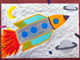 Colorful drawing: Space rocket in the cosmos