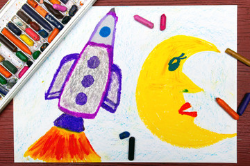 Colorful drawing: Space rocket in the cosmos