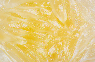 Close up of lemon or pamela texture pulp of the fruit.