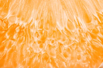 Foto op Plexiglas Close up of grapefruit or orange texture pulp of the fruit. © Ievgenii Meyer