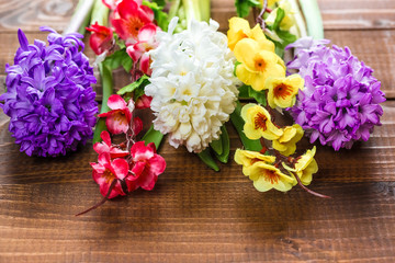 Fresh hyacinth flowers on wooden background. Beautiful idea for greeting cards for Valentine's day, March 8 and mother's day