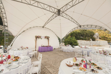 Interior of a wedding tent decoration ready for guests