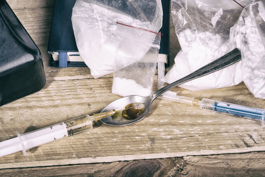 Drug syringe and cooked heroin