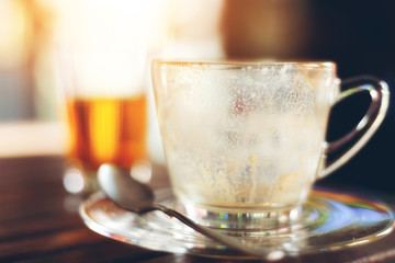 background coffee cup on wooden table
