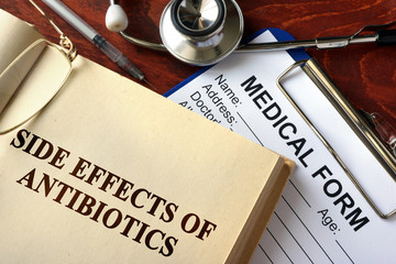 Title side effects of antibiotics on a book.