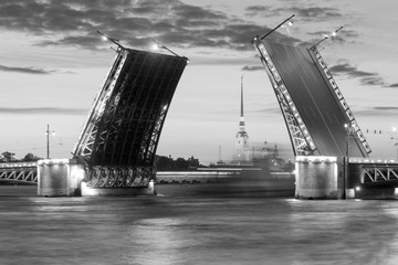 The raised Palace bridge at white nights , black-and-white image