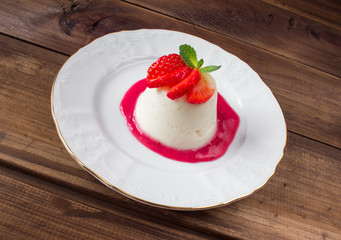 closeup italian dessert Pannacotta with strawberries