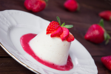 closeup italian dessert Pannacotta with strawberries