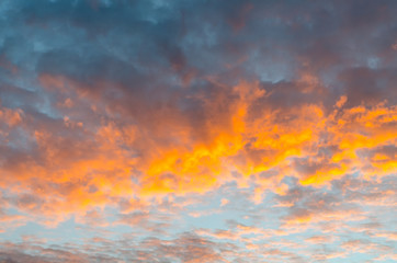 Dramatic sky with golden light in the clouds.